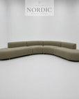 Large curved sofa for living room, lounge or showroom with generous seating and high-end design
