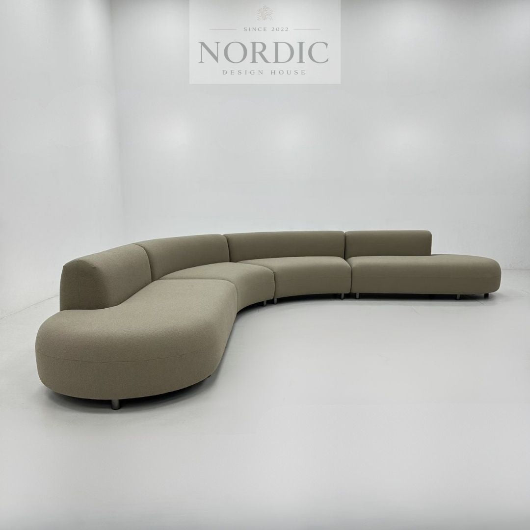Moderne buet sofa Organica i luksuriøst stof
