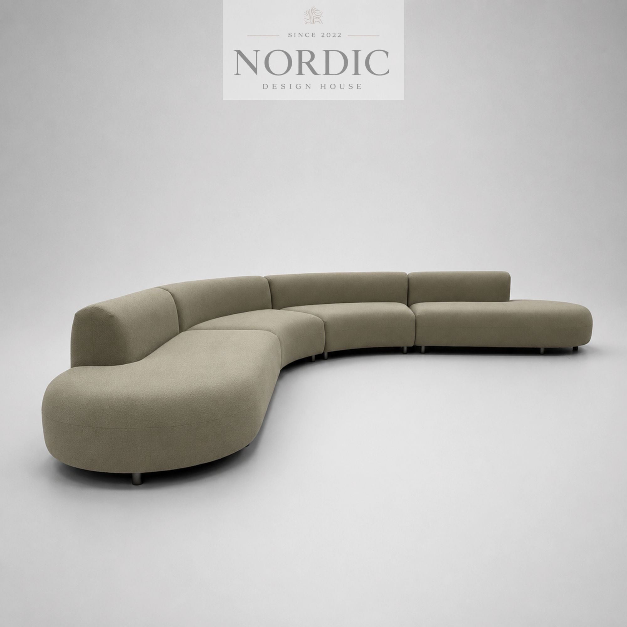 Moderne buet sofa Organica i luksuriøst stof