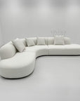 Modern curved sofa in luxury fabric