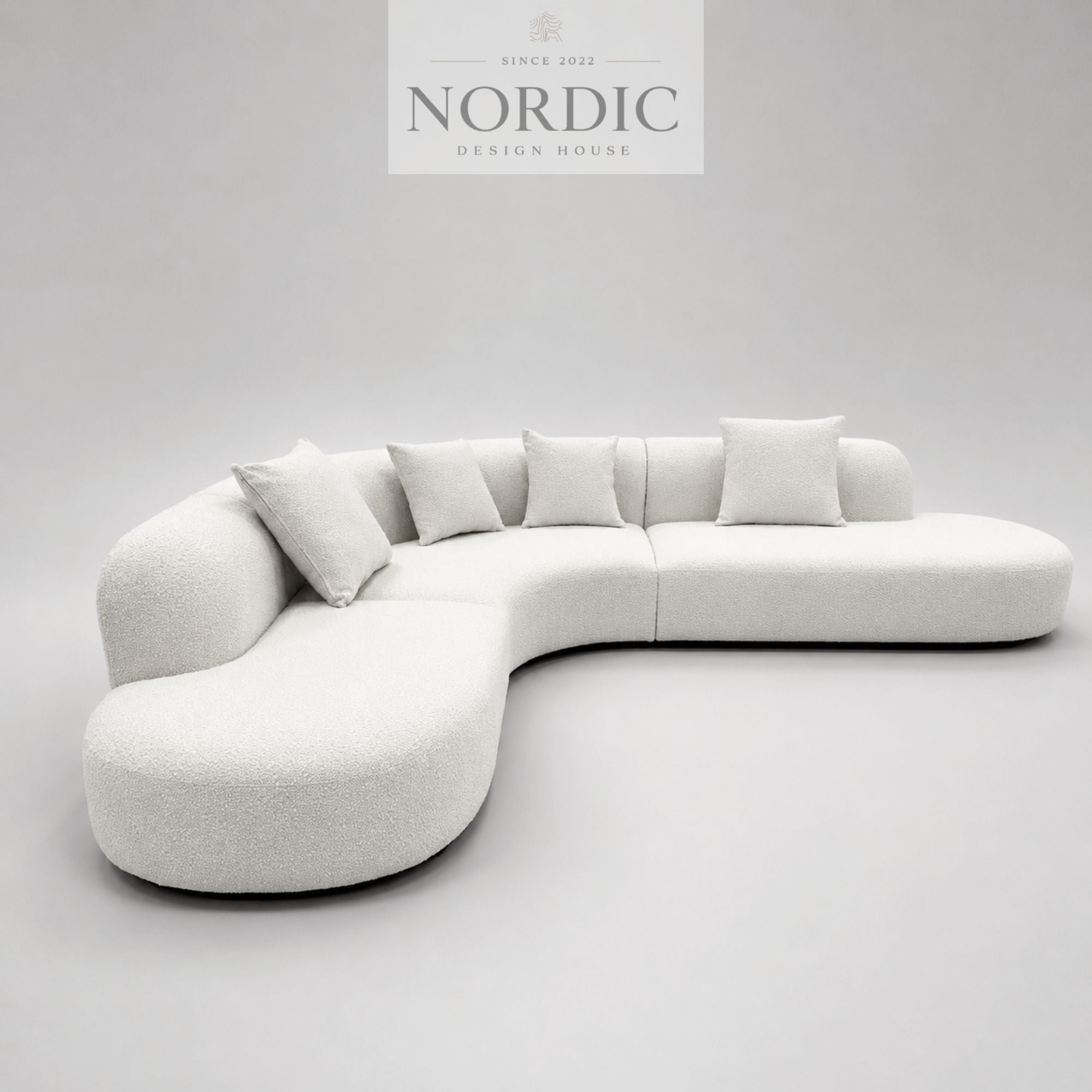 Modern curved sofa in luxury fabric