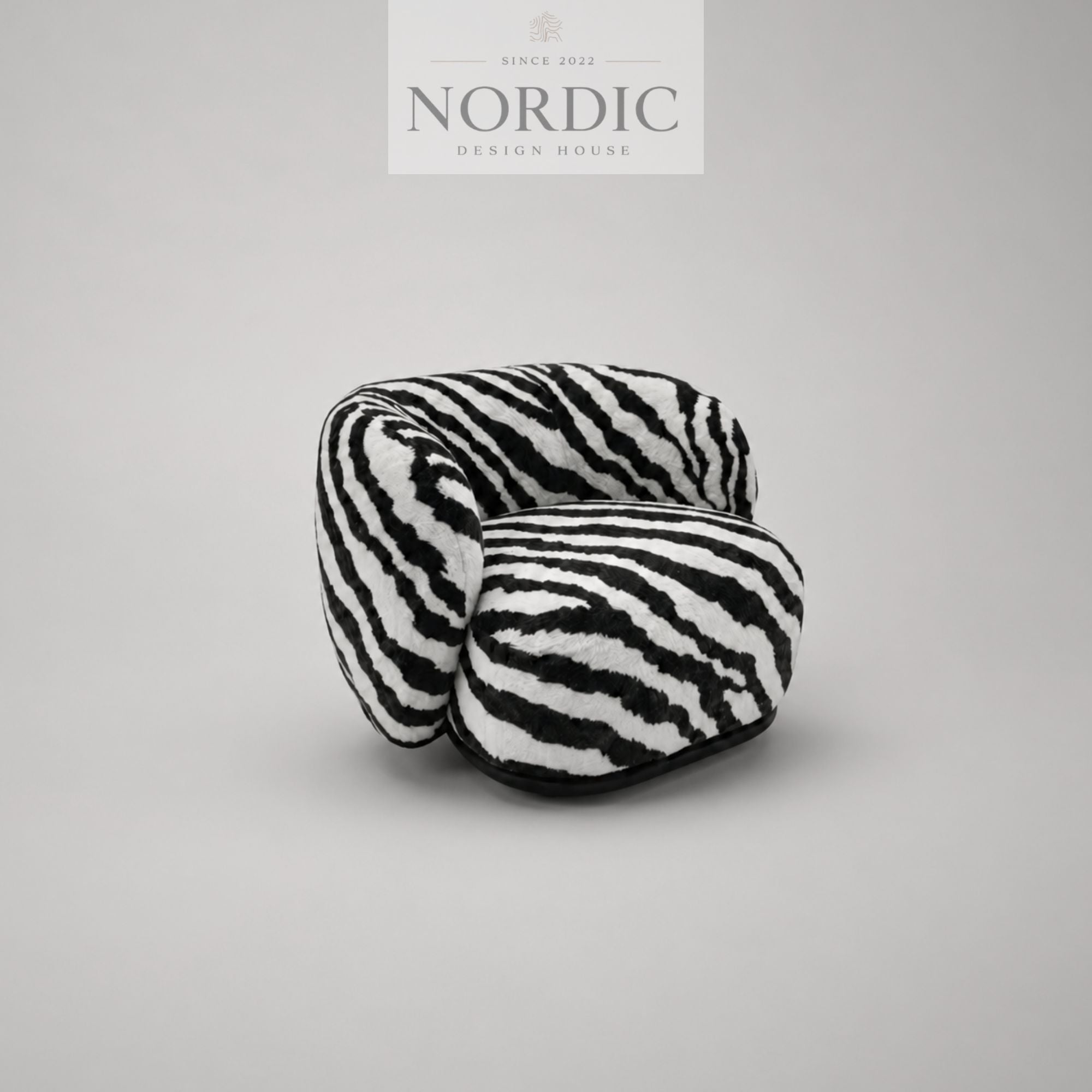 Design loungestol Sandro i zebra-polstring
