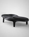 Design sofabord i organisk form i sort asketræ til stilfuld stue eller lounge