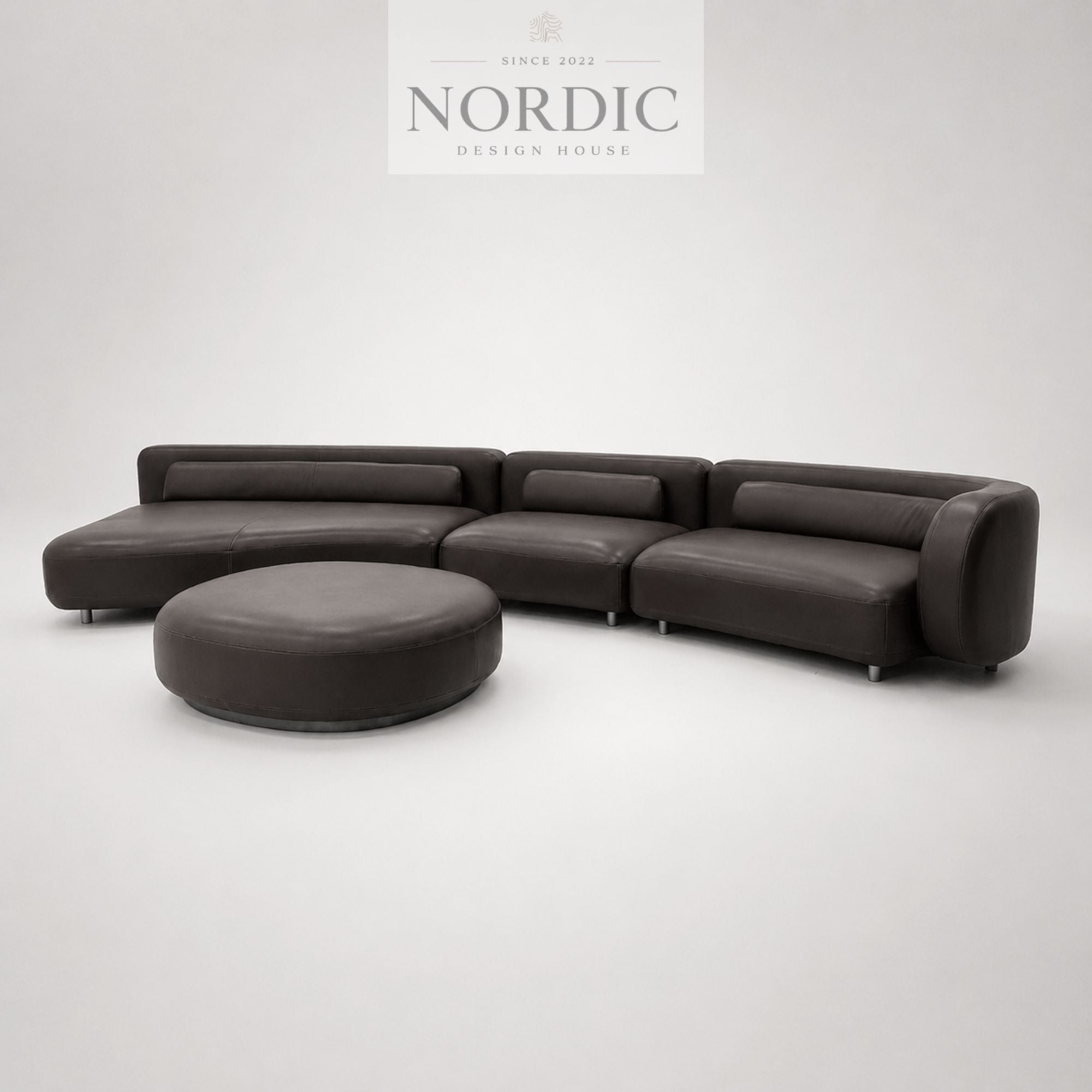 High-end design leather sofa with ottoman in premium leather and modular lounge design